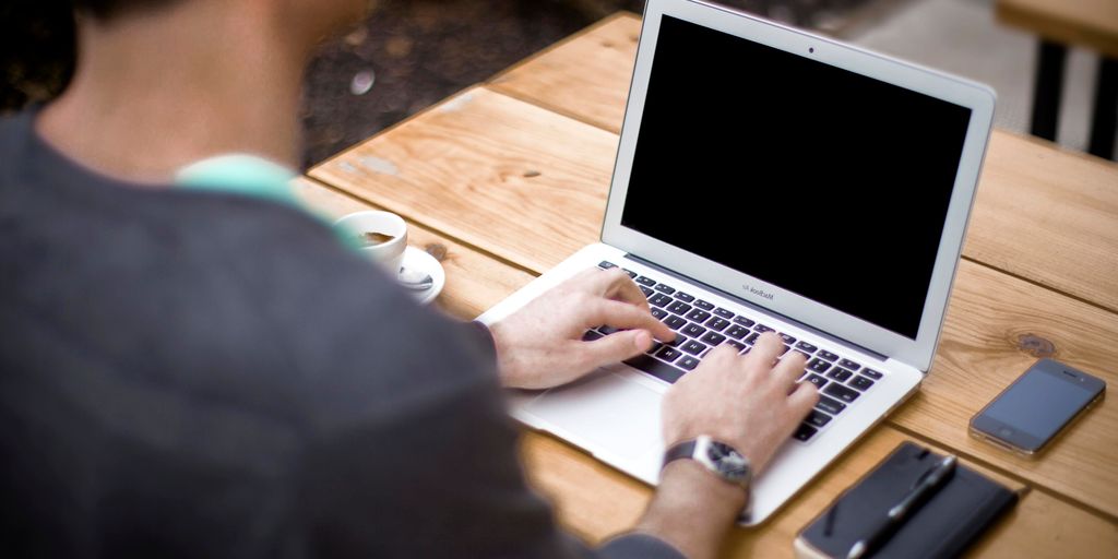 person using laptop with VPN on Chrome, digital security, internet privacy