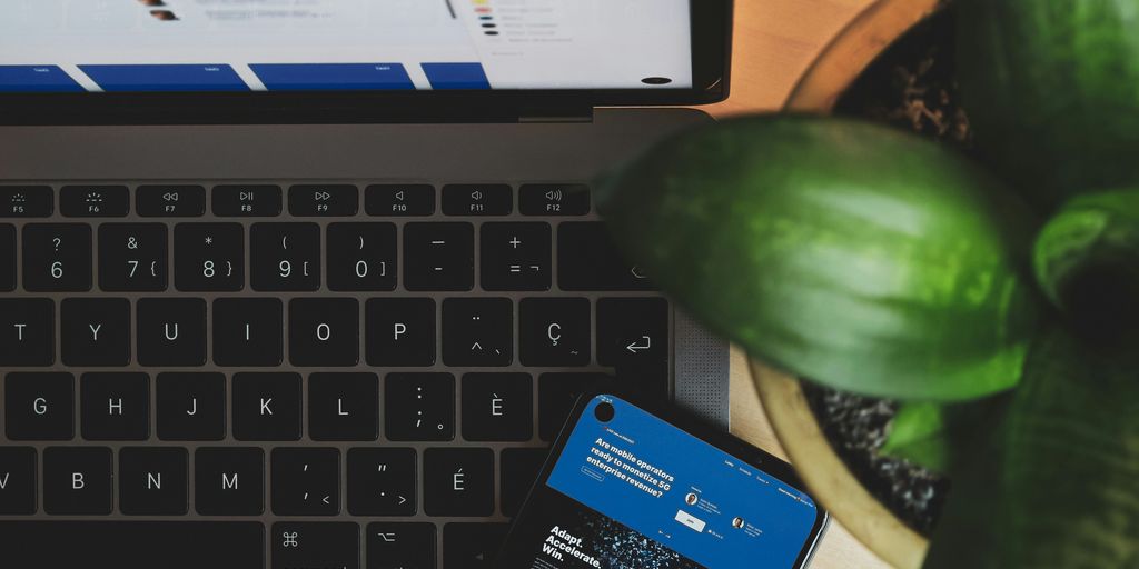 blue and white visa card on black and gray laptop computer